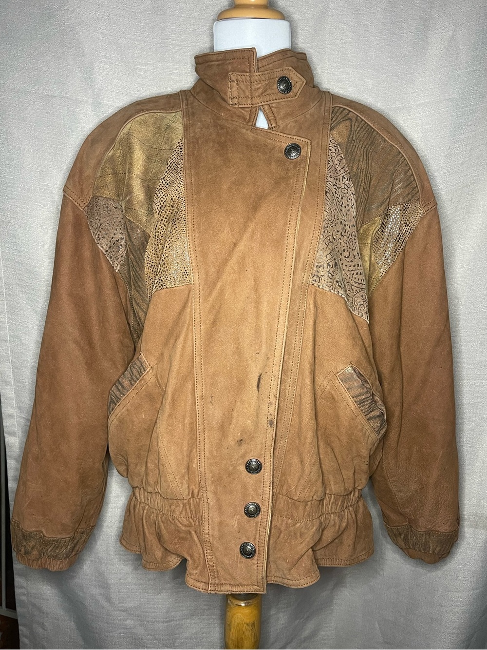 Winlit brown leather bomber jacket with detailed patchwork panels